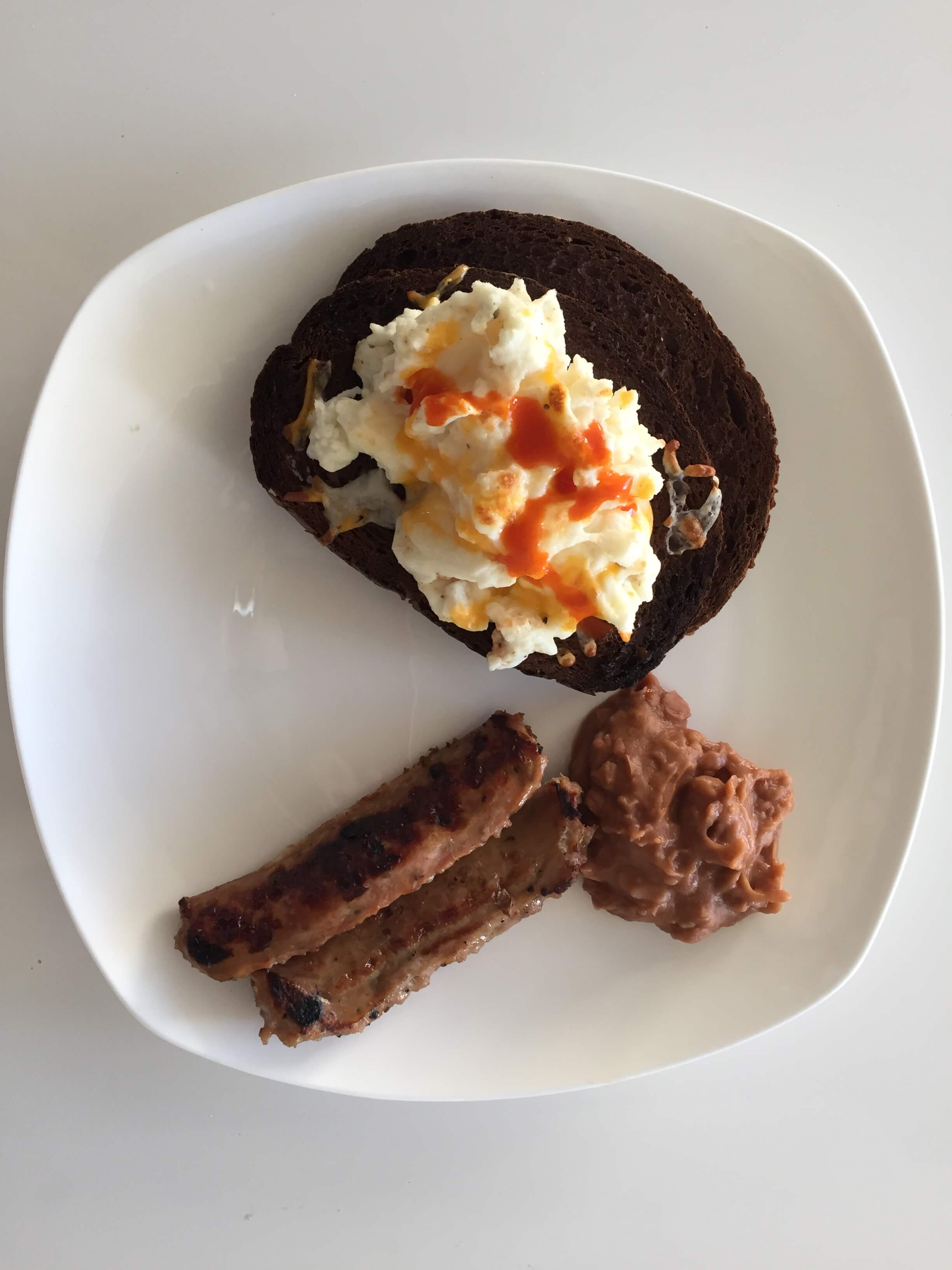 30 Days of Egg Whites: Scrambled Egg Whites on Rye with Turkey Sausage and Refried Beans